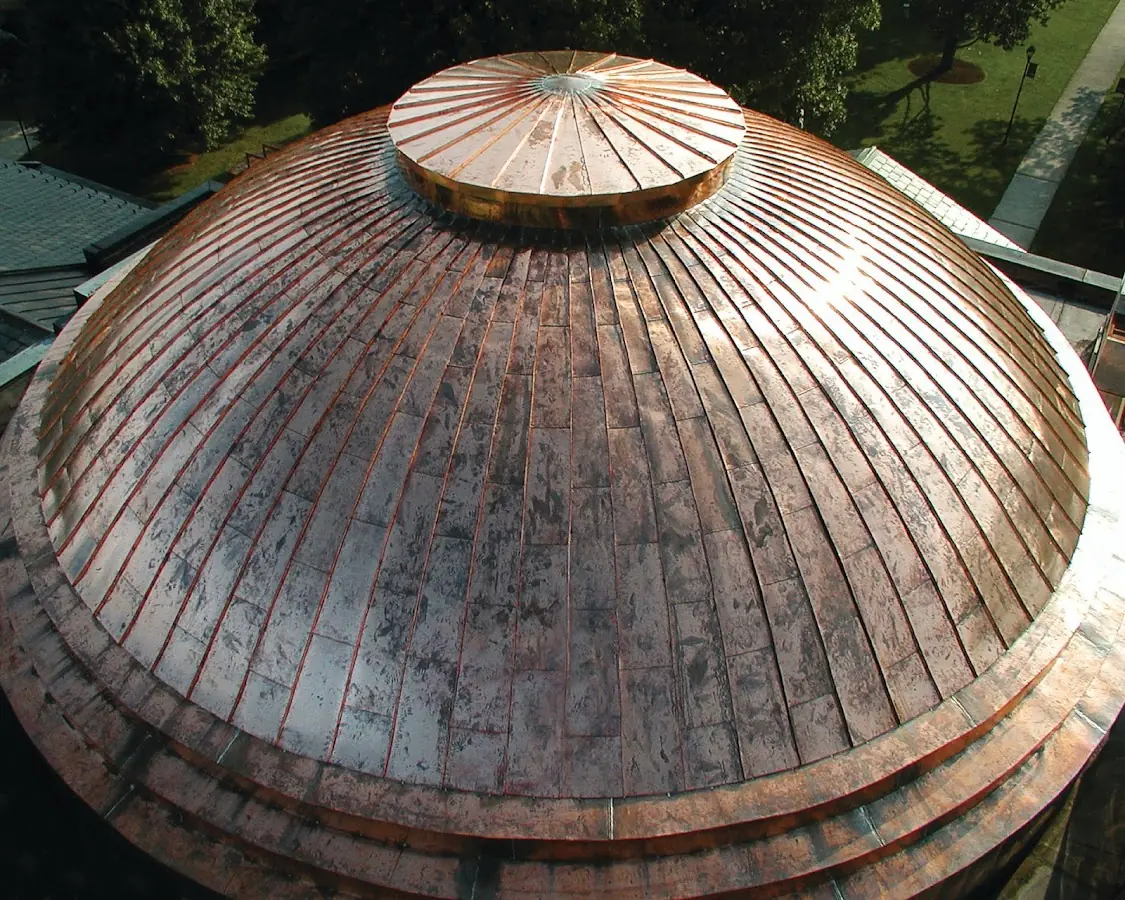 Craftsman Roofing crew installing a new roof in East Setauket